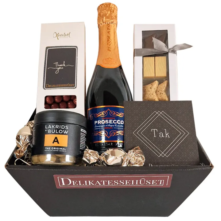 Gavekurv - send en 'tak' med Prosecco-bobler, chokolade og lakrids