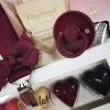 Gave til babyshower - babyforkælelse og chokolade til mor og far
