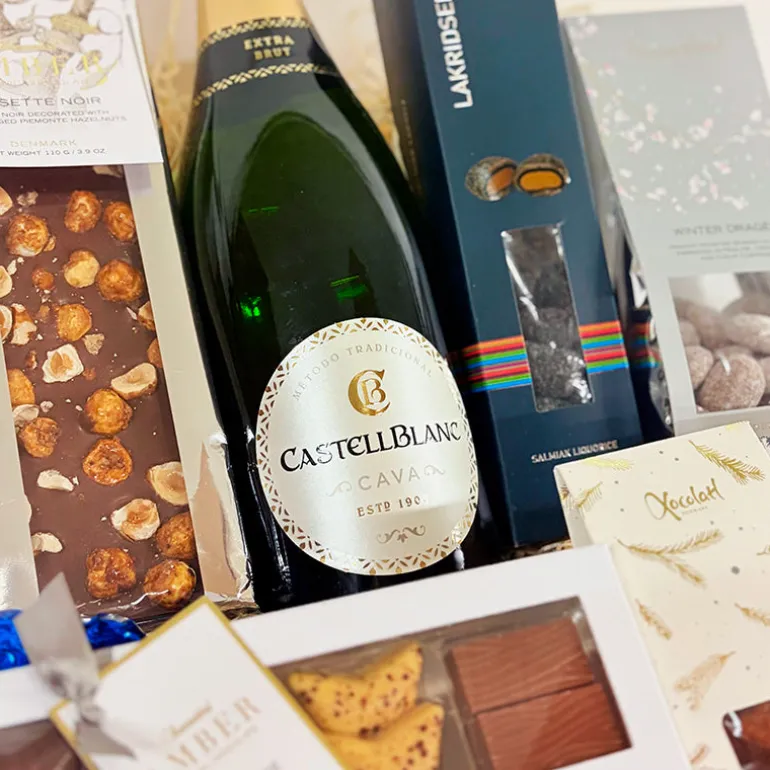 Julegave til medarbejdere - bobler, slik og chokolade til hele familien