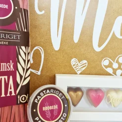 Mors dag gaven med rosévin og delikatesser